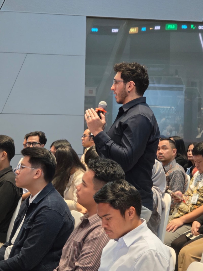 Julian speaking at event